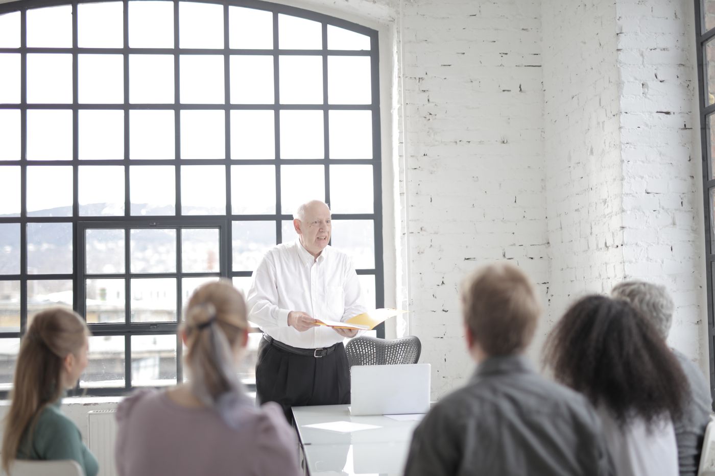 Diverse executives evaluating strategy in a boardroom